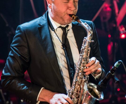 Get in the mood afbeelding voor: New Cool Collective Big Band